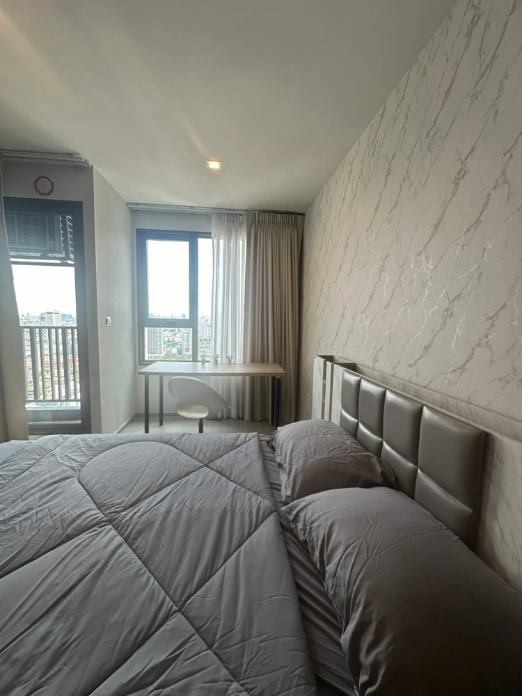 For rent: Life Ladprao. Located on a very high floor with a stunning view. This is an end unit, featuring high-quality wallpaper. Book it now! images