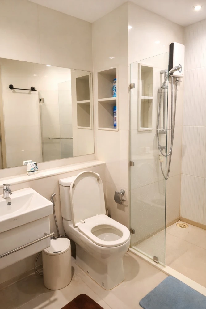 For rent: Life Ladprao condo with multi-functional furniture. The well-designed furniture maximizes space, making the room feel spacious, airy, and in