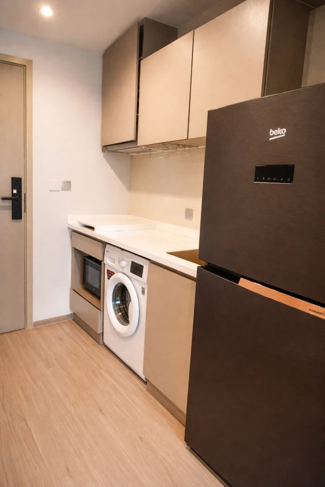 For rent: Life Ladprao condo with multi-functional furniture. The well-designed furniture maximizes space, making the room feel spacious, airy, and in