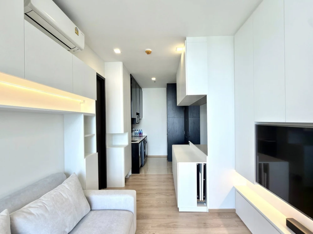 Noble Around Ari condo for rent. Fully furnished with built-in furniture throughout, in a minimalist white style. Ample storage space. Book now to sec