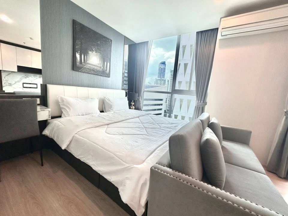 For rent: Noble Revolve Ratchada, 2 bedrooms, spacious living area, prime location. Don't just look, book it! images