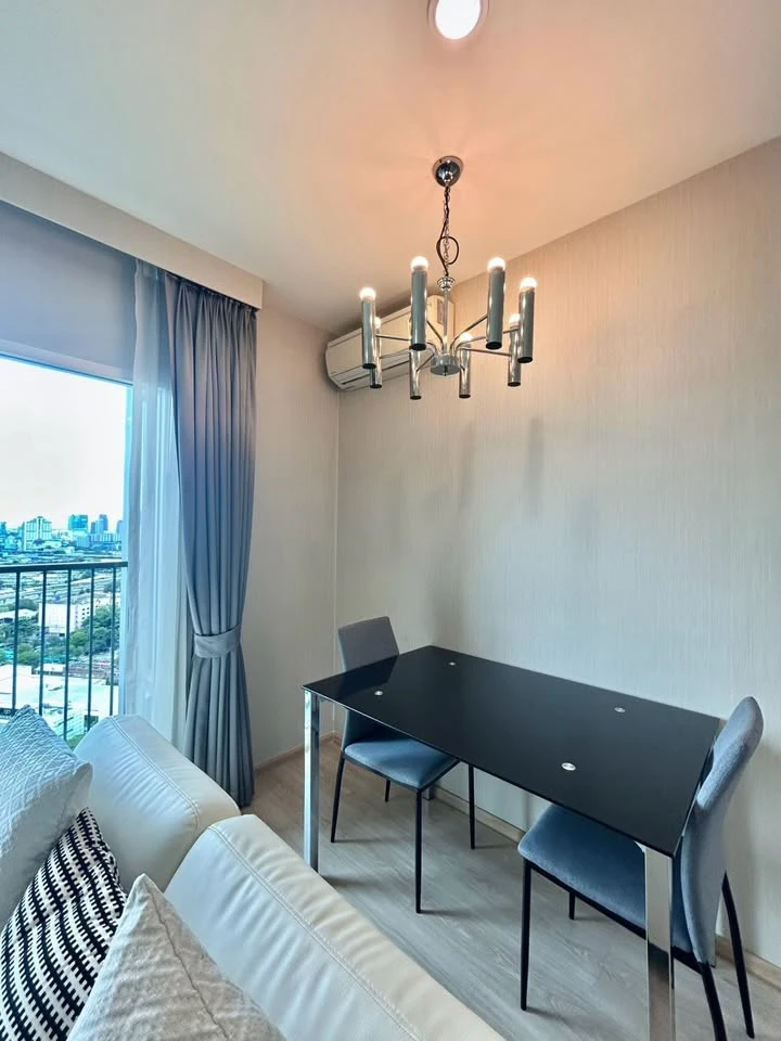 For rent: Noble Revolve Ratchada, 2 bedrooms, spacious living area, prime location. Don't just look, book it!