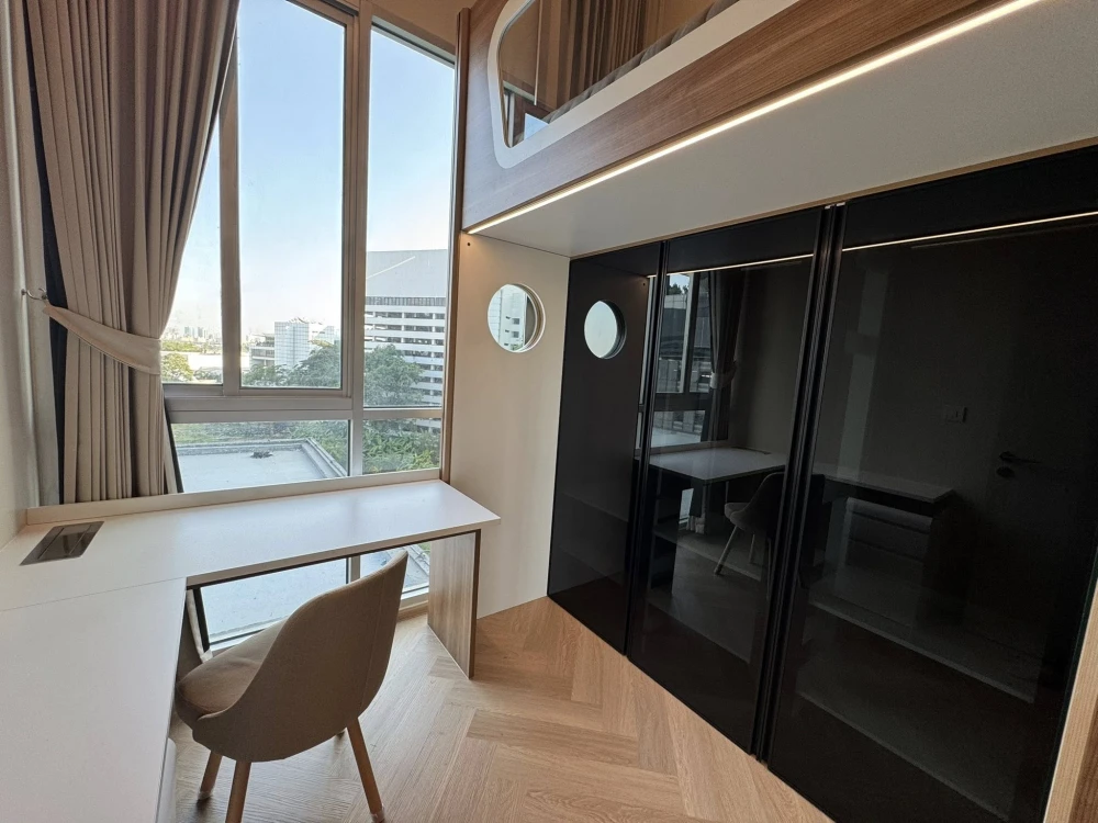 For rent: Noble Revolve Ratchada. 4-meter high ceilings, almost entirely built-in furniture, designed for practicality and comfort.