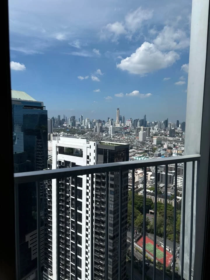 For rent: Noble Revolve Ratchada, top-floor penthouse with unobstructed panoramic views and stunning built-in furnishings. Don't miss out!
