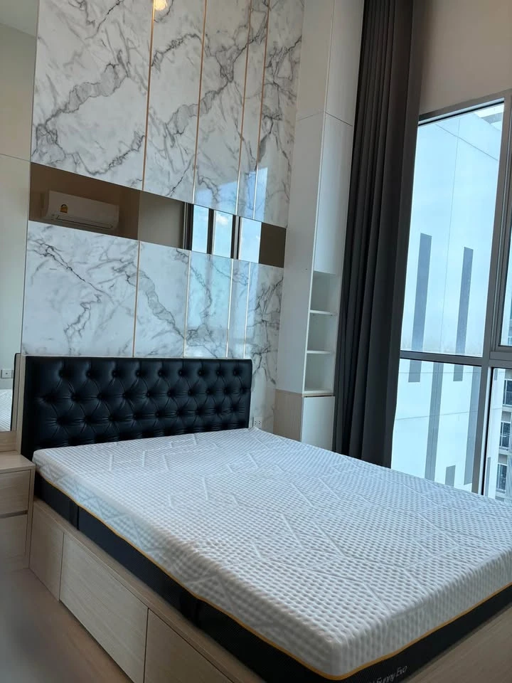 For rent: Noble Revolve Ratchada, top-floor penthouse with unobstructed panoramic views and stunning built-in furnishings. Don't miss out!