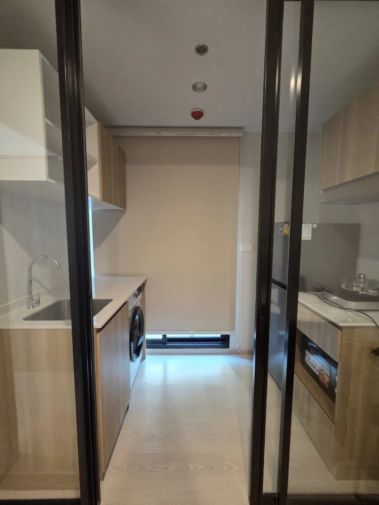 For rent: Nue Connex Don Mueang. Pool view, cool and comfortable room, no direct sunlight. Includes blackout curtains, sheer curtains, and UV-blocking