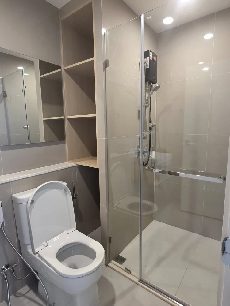 For rent: Nue Connex Don Mueang. Pool view, cool and comfortable room, no direct sunlight. Includes blackout curtains, sheer curtains, and UV-blocking