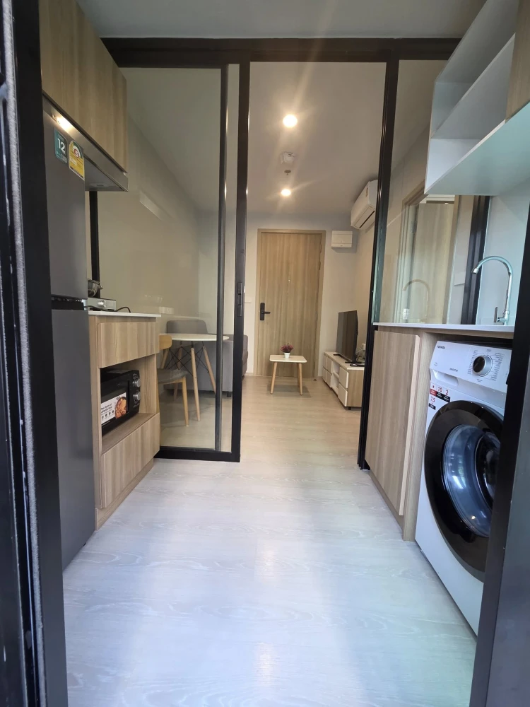 For rent: Nue Connex Don Mueang. Pool view, cool and comfortable room, no direct sunlight. Includes blackout curtains, sheer curtains, and UV-blocking