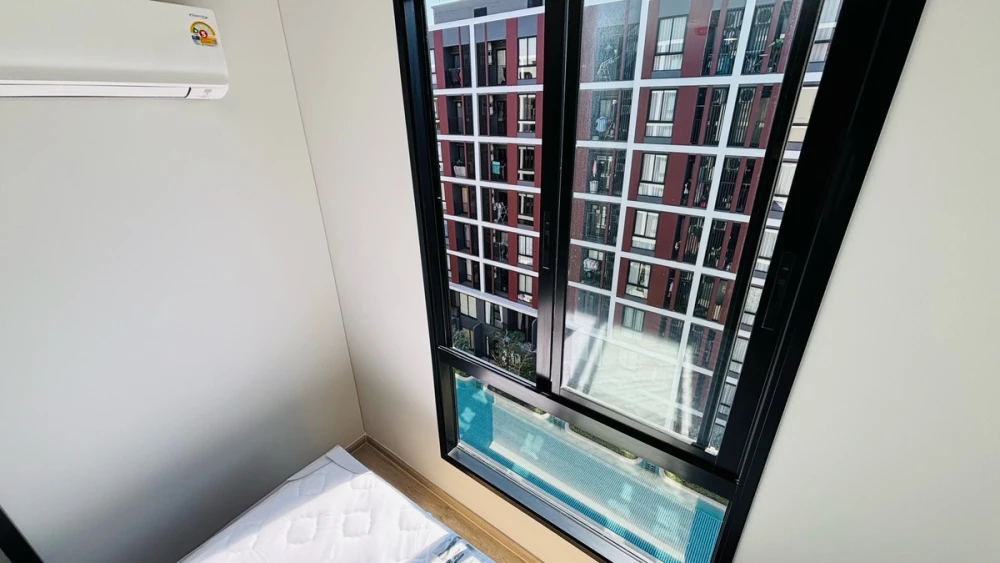 For rent: Nue Core Khu Khot Station, 7th floor, pool view, fully furnished, ready to move in. Book now!