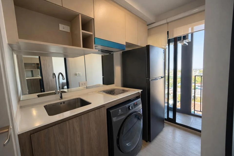 For rent: Nue Core Khu Khot Station studio room with north-facing balcony. Fully furnished and equipped. Don't miss out!