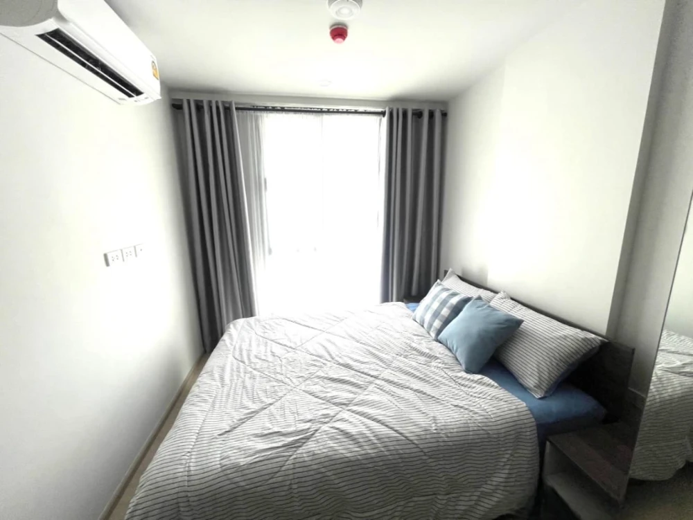 For rent: Nue Cross Khu Khot Station, 4th floor, Building A, corner room, balcony facing north, not hot, private, reserve now.