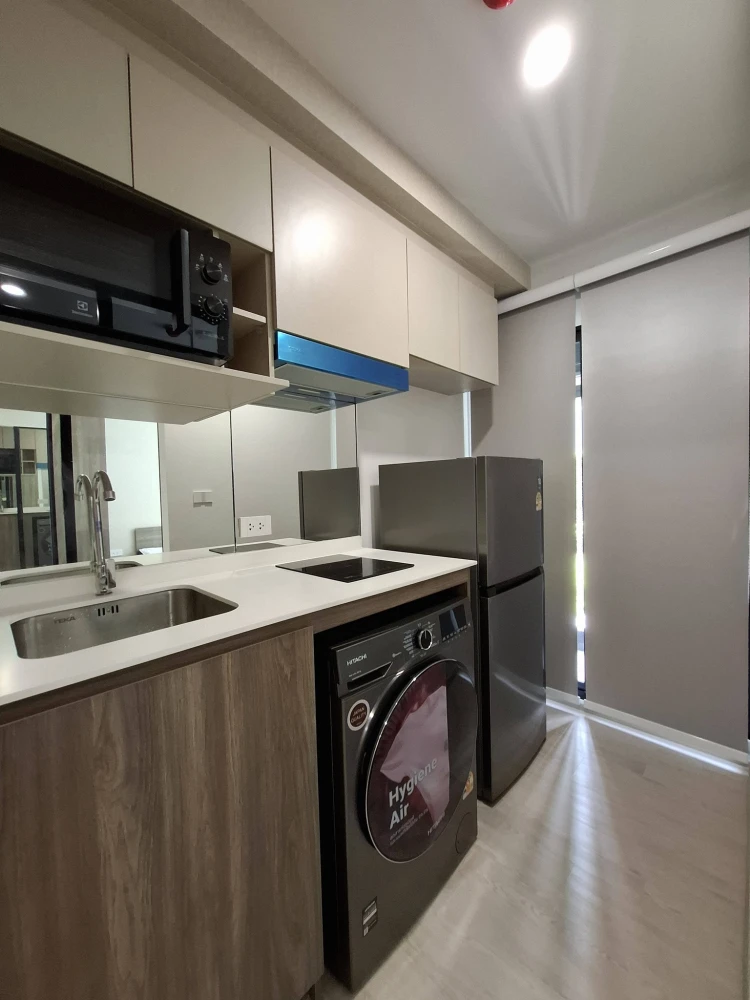 Apartment for rent near Nue Cross Khu Khot Station, garden view, fully furnished. Book now!