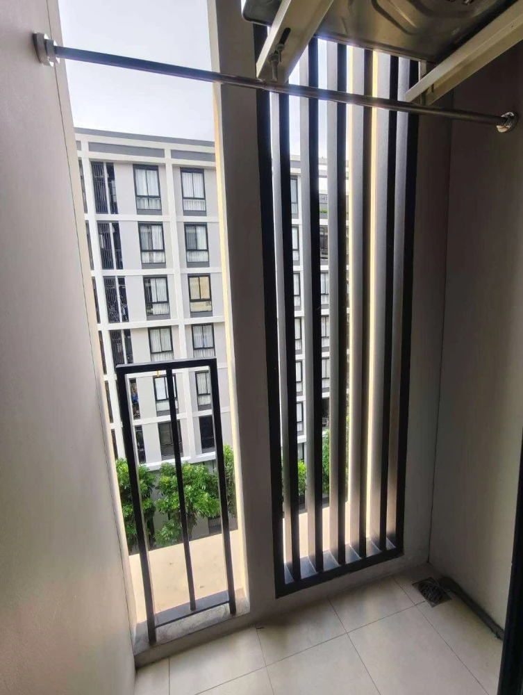 Studio apartment for rent near Nue Cross Khu Khot Station. Fully furnished with appliances and garden view. Book now!