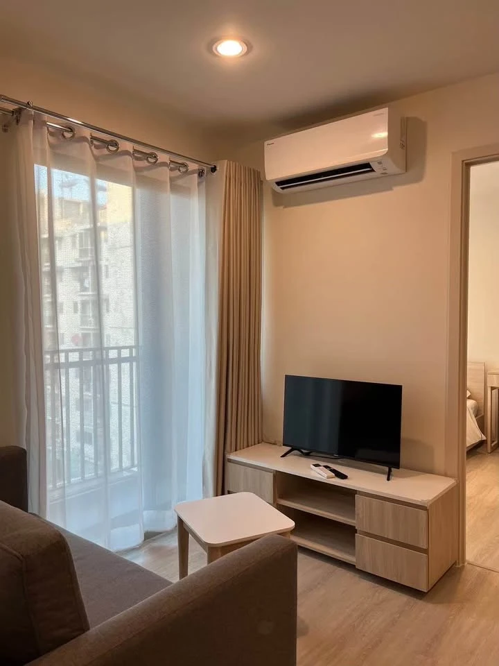 Two-bedroom apartment for rent at NUE Z-SQUARE Suan Luang Station, fully furnished. Book now!