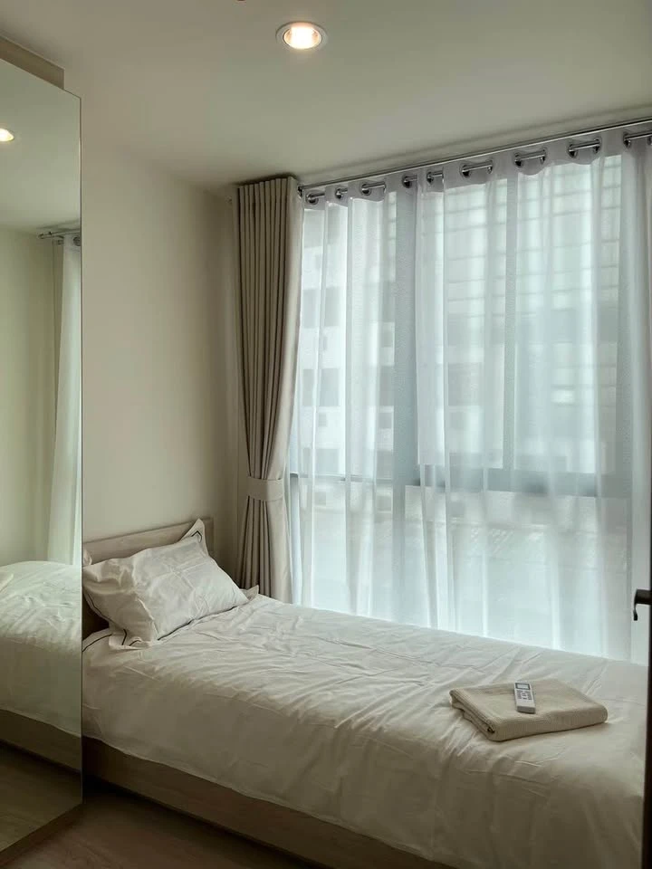 Two-bedroom apartment for rent at NUE Z-SQUARE Suan Luang Station, fully furnished. Book now!
