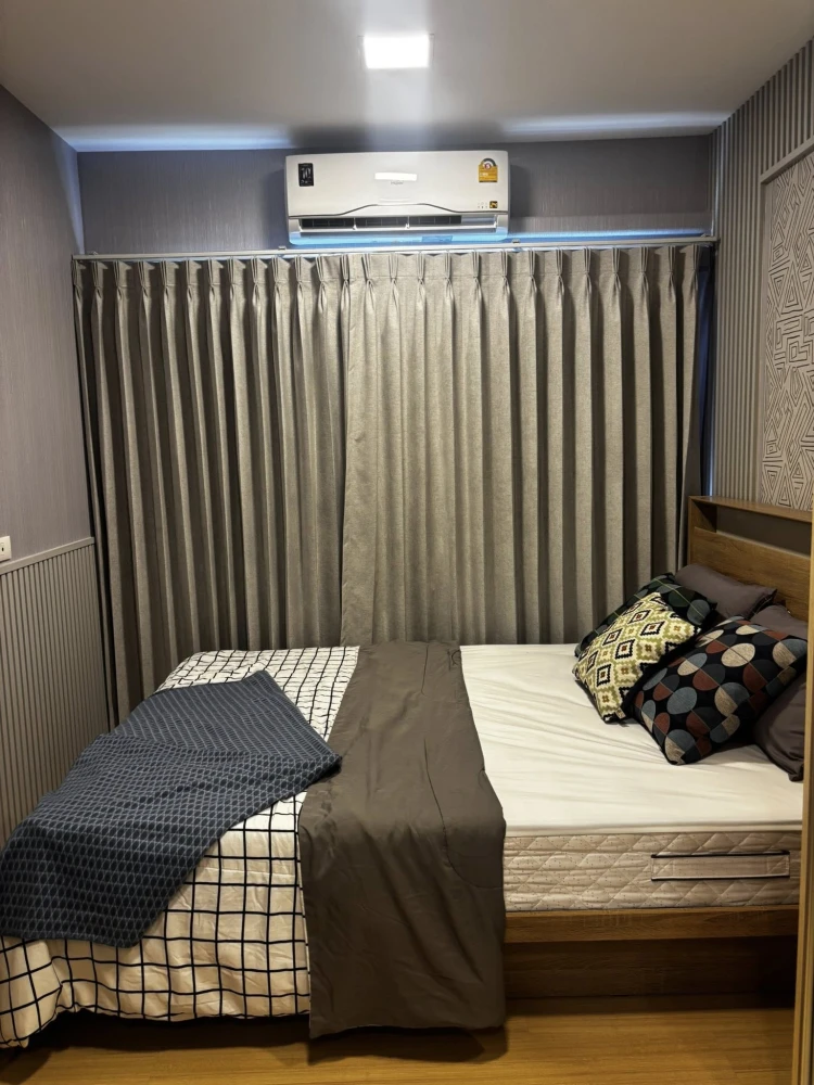 Plum Condo Rangsit Fresh for rent, a cozy room with a theme, well-built walls, and complete furniture. Reserve now!