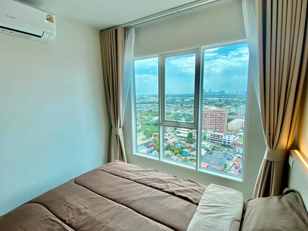 For rent: Regent Home Bangna. A lovely unit with high-quality built-in furniture and stunning river views. Don't miss out!