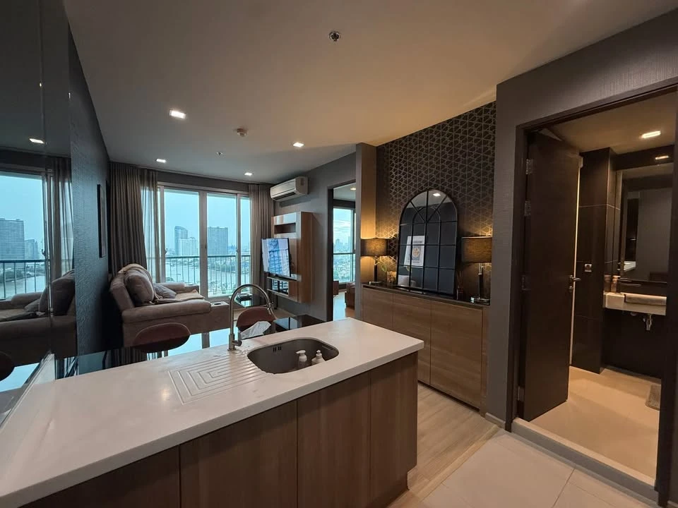 For rent: RHYTHM SATHORN, 29th floor, very high floor, river view, fully furnished. Just bring your belongings and move in.