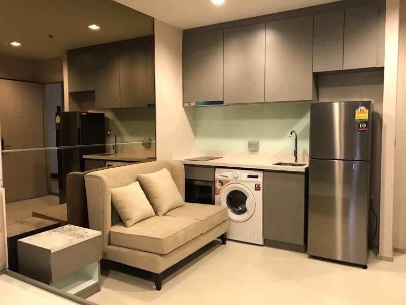 For Rent: Rhythm Sukhumvit 36-38, 12th floor, pool view. Fully furnished and inviting—book now!