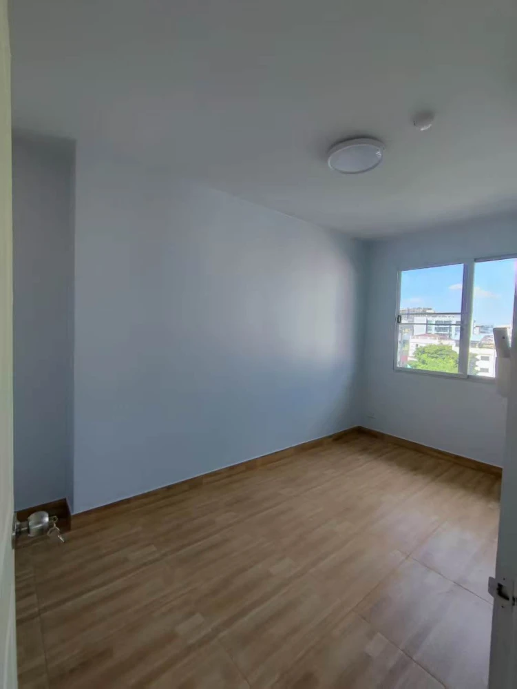 For rent: Supalai City Home Ratchada, unfurnished unit with spacious living area, great location, and convenient transportation. Book now!