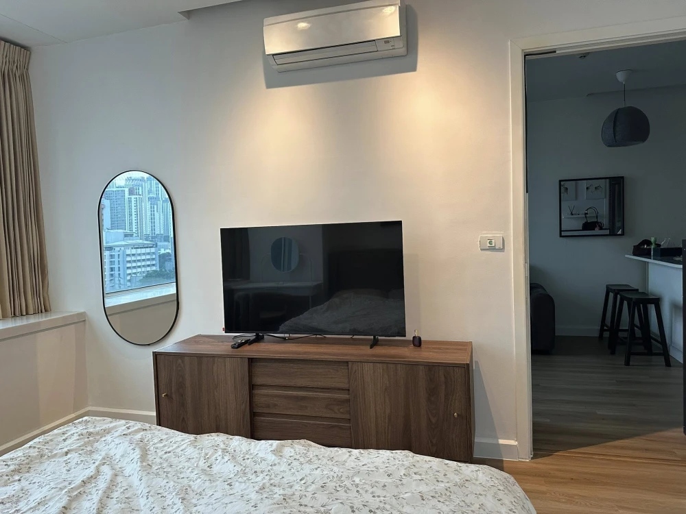 TC Green Condo Rama 9 for rent. Corner unit, north facing, pool & green garden view. Panoramic windows, no obstructing buildings, good ventilation. Bo