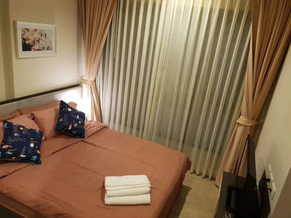 For rent: The Base Central Pattaya, pool view, with washing machine in the room. Ready to move in immediately.