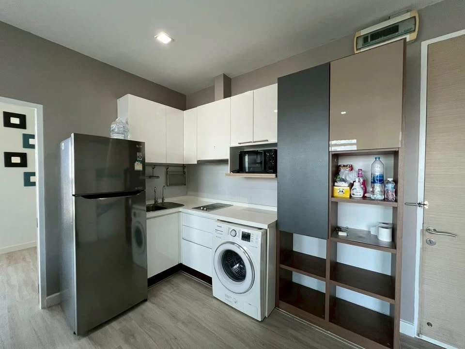 For rent: The Coast Bangkok, 2 bedrooms, spacious living area, fully furnished with built-in furniture, beautiful view. Book now!