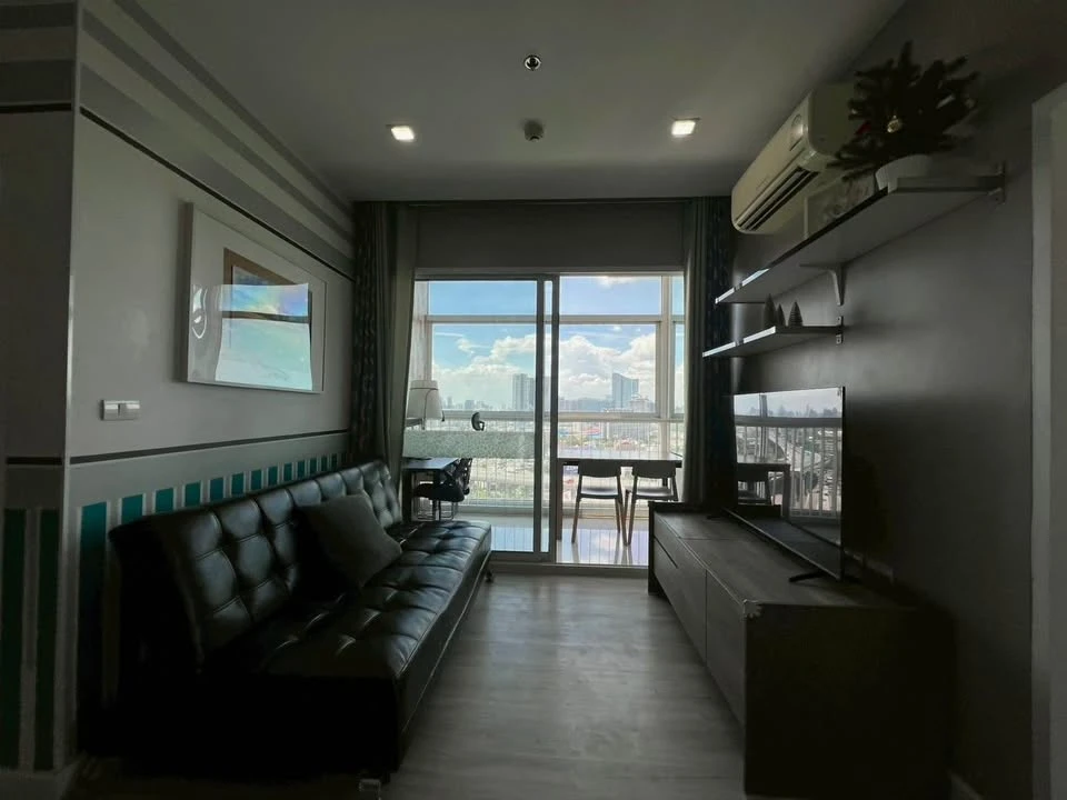 For rent: The Coast Bangkok, 2 bedrooms, spacious living area, fully furnished with built-in furniture, beautiful view. Book now!