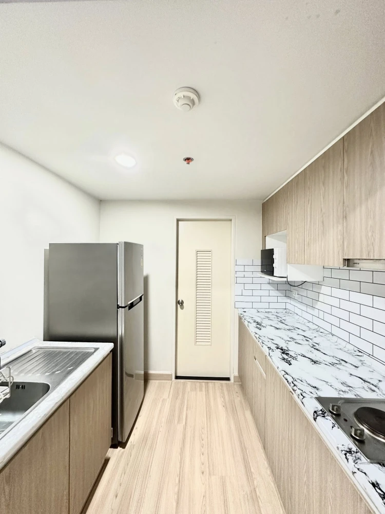For rent: The Escape Condominium Sukhumvit 101/1, area 42 sq m, 4th floor, Building E, bedroom with built-in furniture, book now.