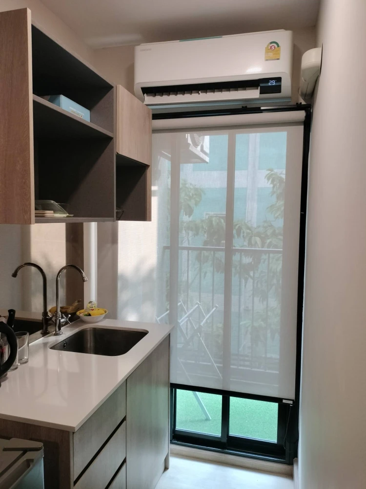 For rent: The Indeed Condo Amata, 2nd floor unit with high-quality built-in furniture. Move-in ready!
