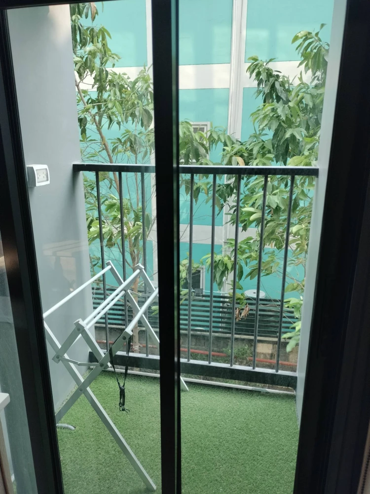 For rent: The Indeed Condo Amata, 2nd floor unit with high-quality built-in furniture. Move-in ready!