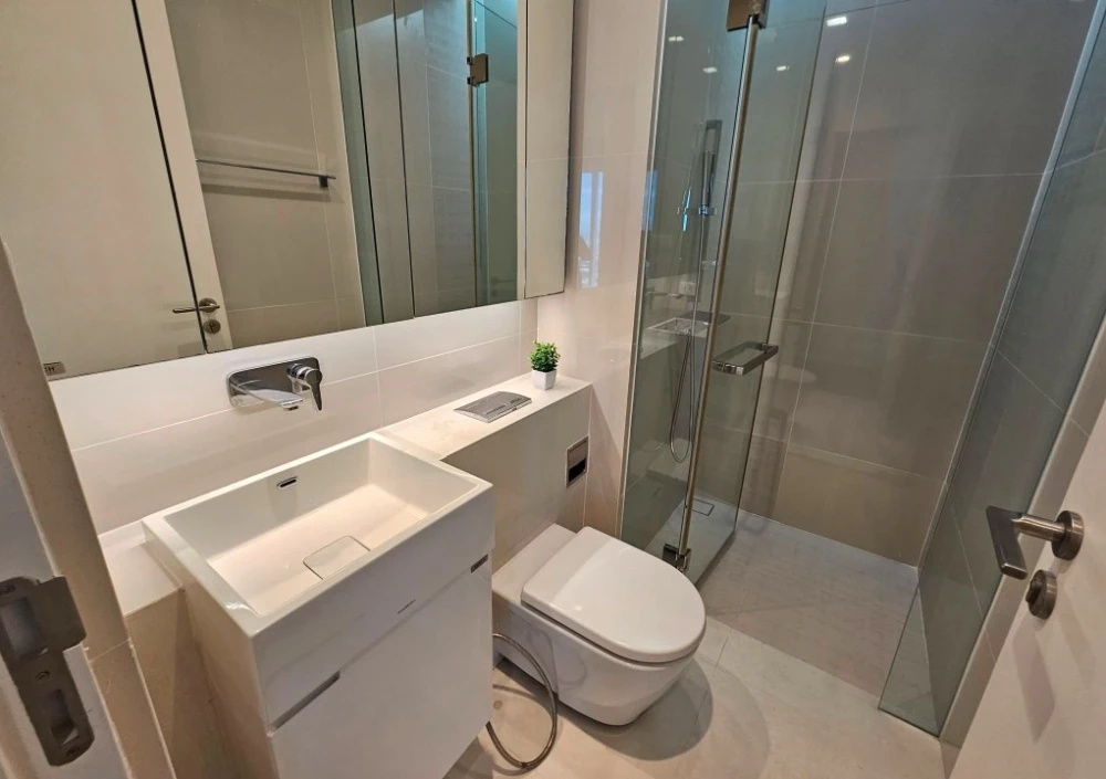 For rent: The Saint Residences, a premium 2-bedroom corner unit on a high floor with high-quality furniture, mostly made of real wood. Book now!