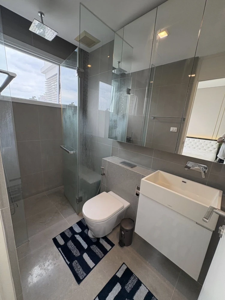 For rent: The Saint Residences, a beautifully decorated room with excellent built-in furniture and plenty of usable space. Don't miss out!