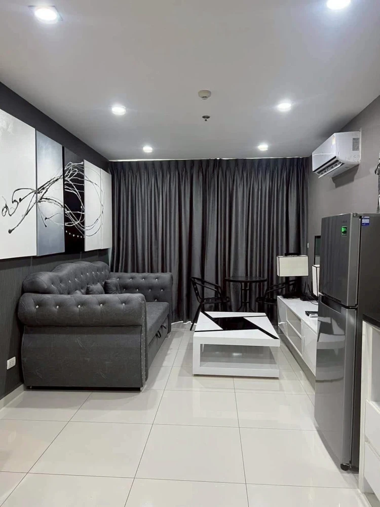 For rent: The Vision, a comfortable room with a large sofa for sitting and a sea view. If it's this good, what are you waiting for?