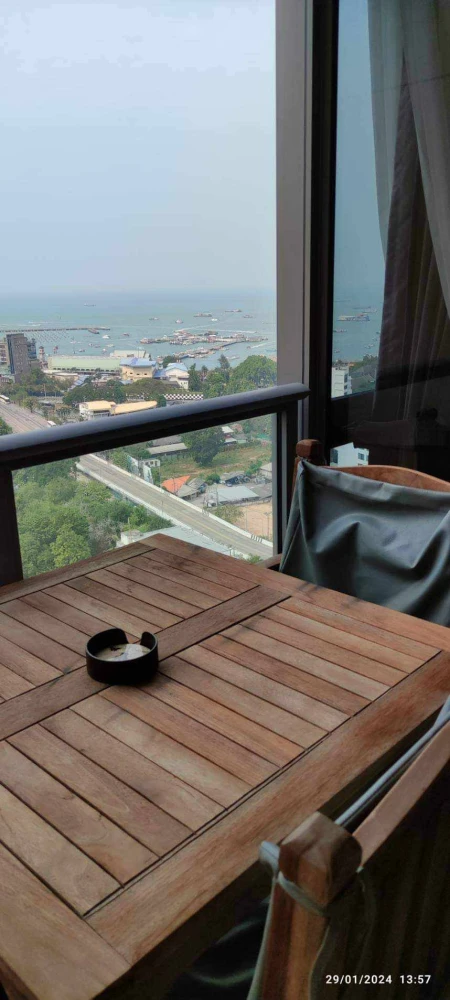 For rent Unixx South Pattaya 2 bedrooms, 2 bathrooms, 21st floor, beautiful swimming pool view, beautiful sea view, fully furnished, book now.
