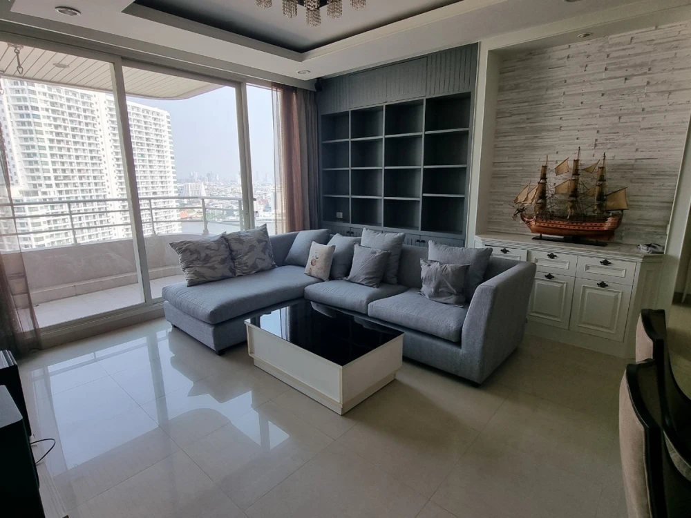For rent: Watermark Chaophraya River, 2 bedrooms, spacious living area, prime location, stunning unblocked views. Book now!