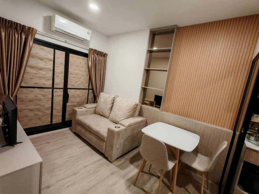 For rent: Xim Suksawat - Rama 3. City and river view from the balcony, no tall buildings obstructing the view. The room is divided into separate zones