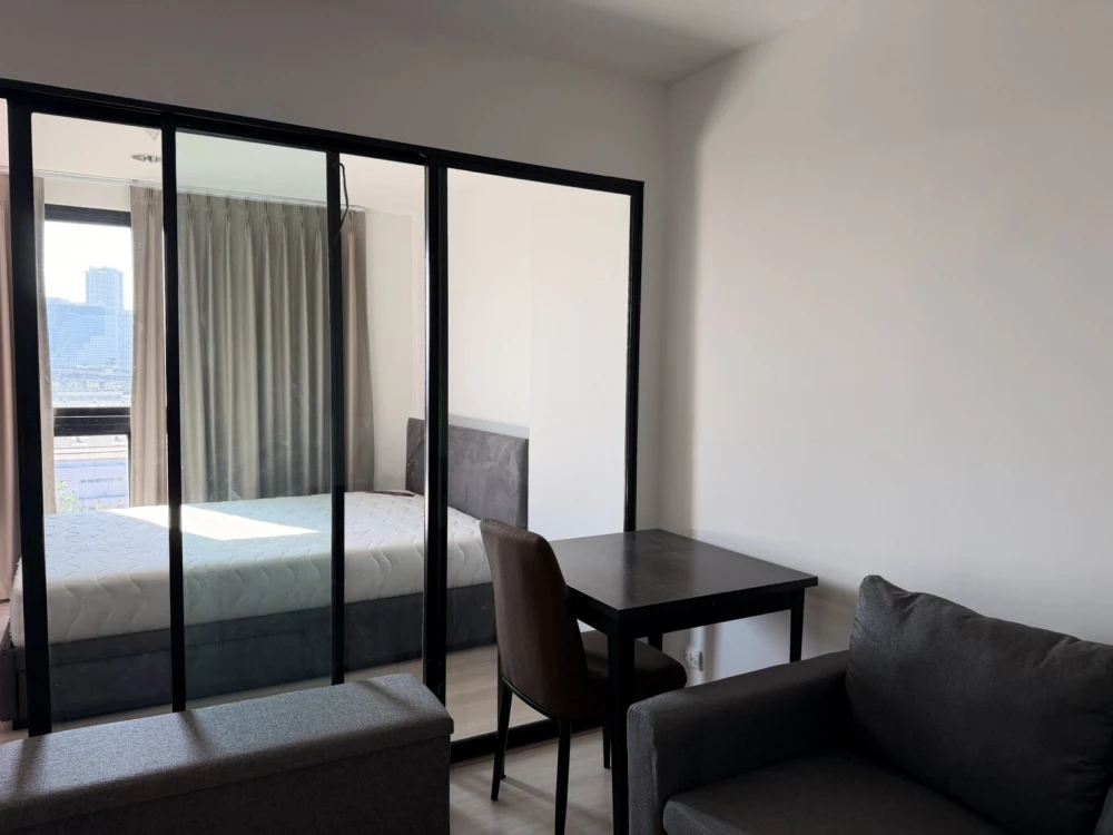 Condo for rent at Rise Rama 9. The unit is partitioned into separate, clearly defined zones. Great value! Book now, don't miss out!