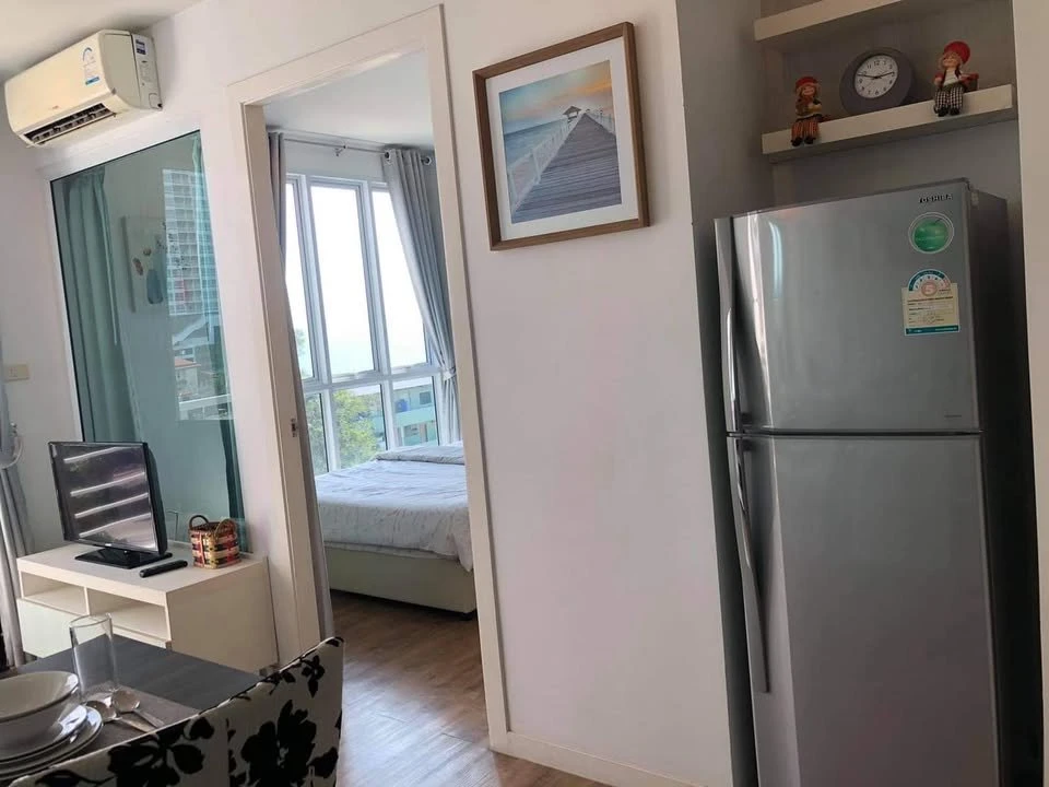 For rent: Neo Condo Seaview Pattaya @ Jomtien (Jomtien). Bedroom with stylish wallpaper. Beautiful sea view. Book now, get it first.