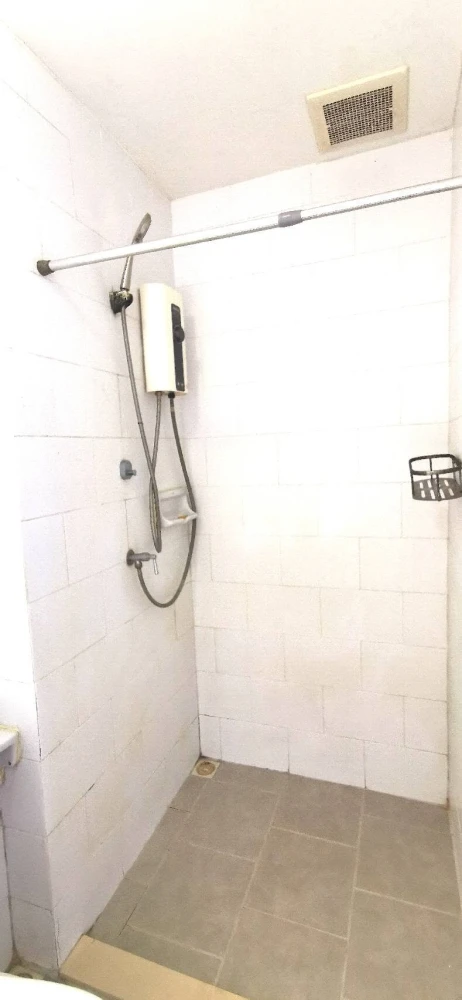 For Rent: Plum Condo Bangyai Station (Phase 1). Bright blue-themed unit on the top floor with a beautiful view. The room is shielded from direct sunli