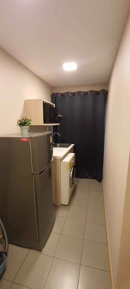 For rent: Plum Condo Rangsit Alive Phase 1, near Bangkok University, 4th floor, Building D. Fully furnished with appliances, ready to move in.