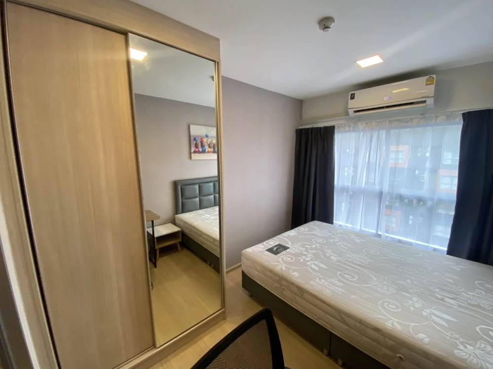 For rent: Plum Condo Rangsit Fresh, 8th floor, pool view. Clean room with built-in furniture and mirrors. Ready to move in.