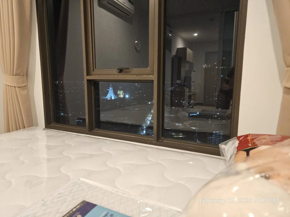 For rent: Regent Home Wutthakat. Bedroom view of the Phra Pathom Chedi, room located away from the noise of the diesel train, north-facing with good v