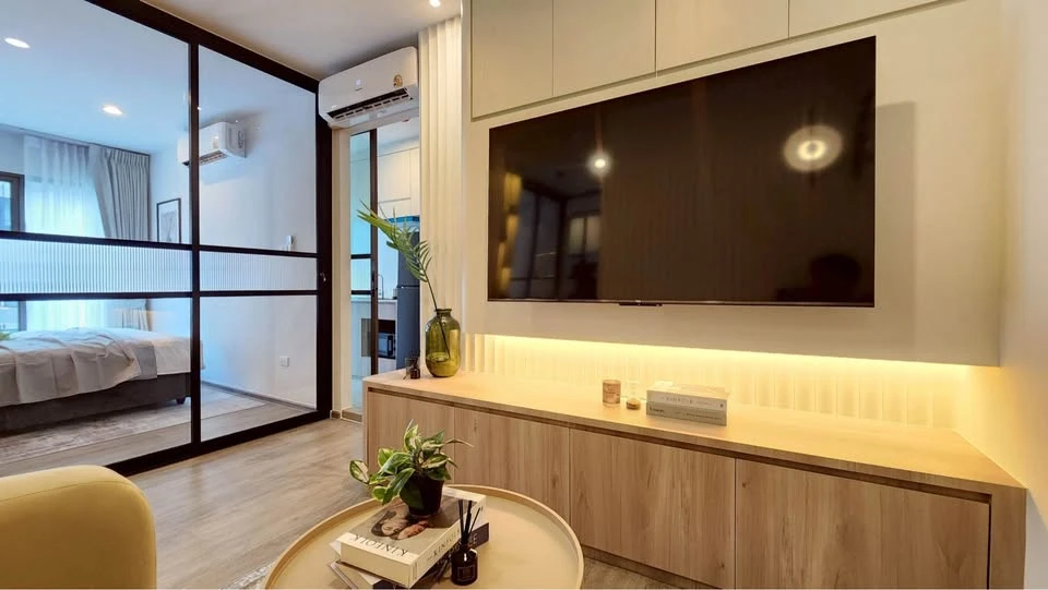 For rent: Regent Home Wutthakat. The room is on a very high floor with a beautiful city view. It's decorated with amazing built-ins and is as beautifu