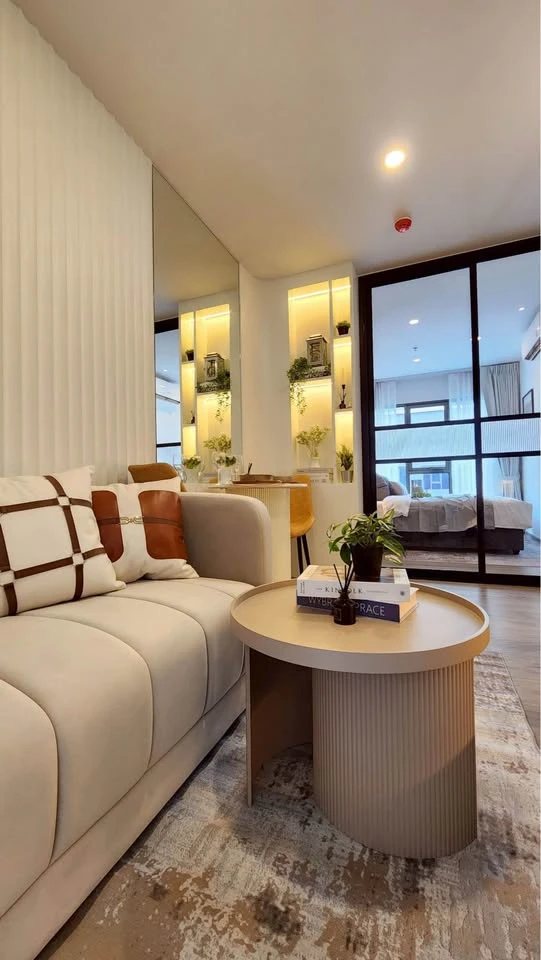 For rent: Regent Home Wutthakat. The room is on a very high floor with a beautiful city view. It's decorated with amazing built-ins and is as beautifu