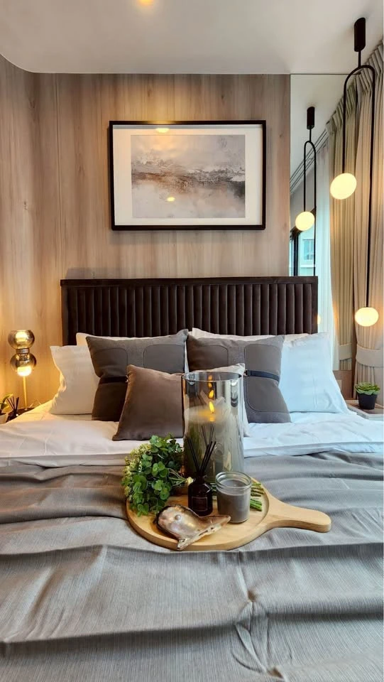 For rent: Regent Home Wutthakat. The room is on a very high floor with a beautiful city view. It's decorated with amazing built-ins and is as beautifu