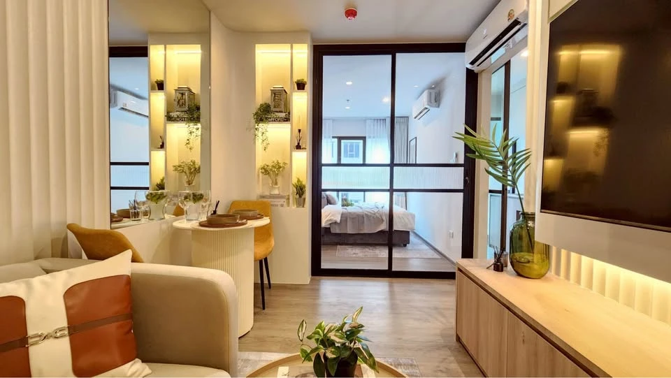 For rent: Regent Home Wutthakat. The room is on a very high floor with a beautiful city view. It's decorated with amazing built-ins and is as beautifu