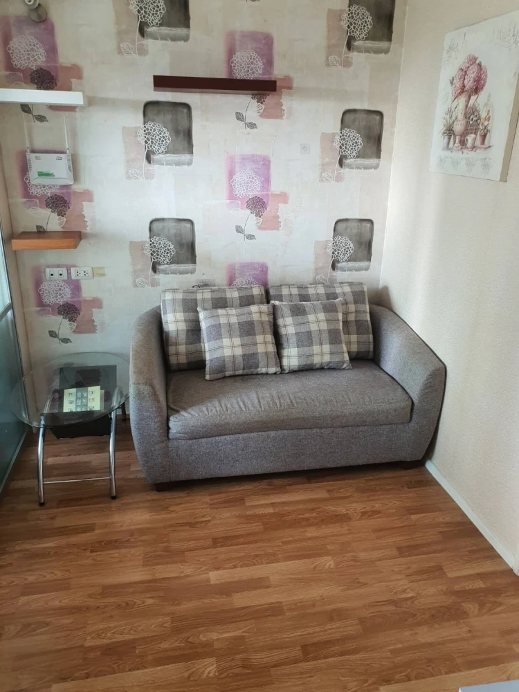 For rent: Lumpini Ville Naklua - Wongamat. A good-sized room with a well-designed layout, including a relaxation area, workspace, kitchen area, and a