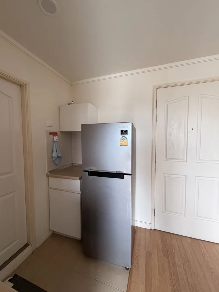 For rent: Lumpini Ville Chaengwattana-Pak Kret, private balcony with city and swimming pool views, fully furnished with appliances, ready to move in.