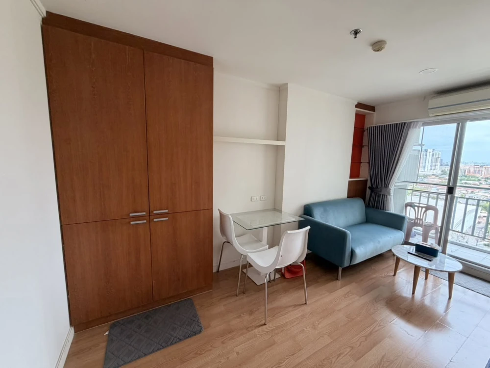 For rent: Lumpini Ville Chaengwattana-Pak Kret, private balcony with city and swimming pool views, fully furnished with appliances, ready to move in.